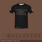 Black t-shirt with humorous text on a mocha background