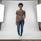 Female model wearing a brown and beige coffee pattern shirt with blue jeans standing in a studio setting with lighting equipment.